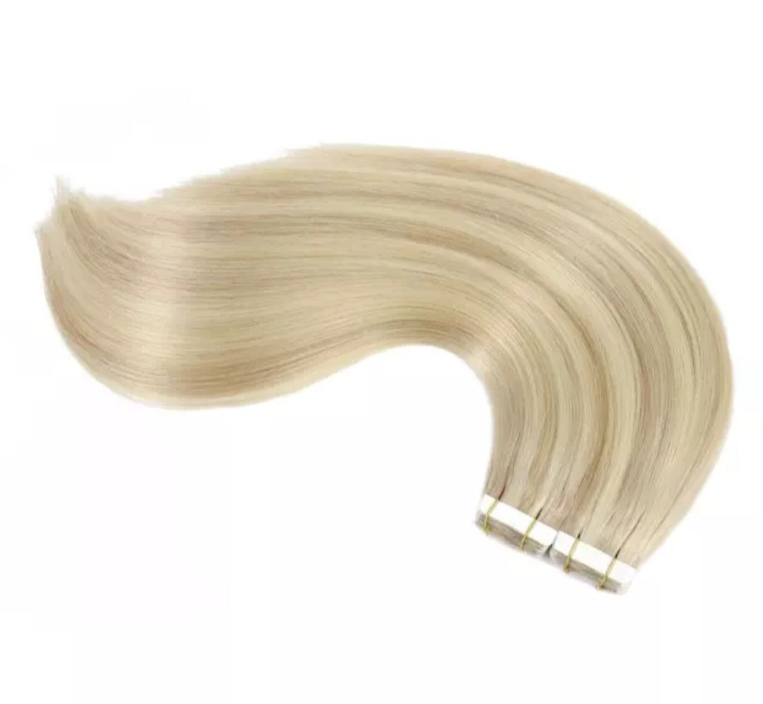Tape-in extensions Blonde highlights. ( 100gram 18")